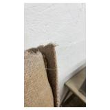 Collection of Assorted Rolled Carpets and Remnants