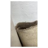 Collection of Assorted Rolled Carpets and Remnants