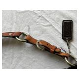 Coach Leather Handbag with Signature Design