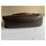 Coach Leather Handbag with Signature Design