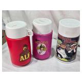 Collection of Vintage Thermo Bottles Featuring ALF, Barbie, Raggedy Ann, Mr. T, Garfield, Lazer Tag, and Holly Hobbie