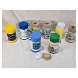 Lot of Vintage Lunch Box Thermo Bottles Featuring Various Designs such as Aladdin and Sesame Street