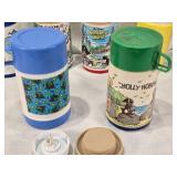 Lot of Vintage Lunch Box Thermo Bottles Featuring Various Designs such as Aladdin and Sesame Street