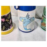 Lot of Vintage Lunch Box Thermo Bottles Featuring Various Designs such as Aladdin and Sesame Street