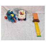 Fisher-Price Vintage Toys including 1973 Bouncing Buggy, Cookie Monster Pull Toy, and Measuring Man