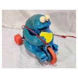 Fisher-Price Vintage Toys including 1973 Bouncing Buggy, Cookie Monster Pull Toy, and Measuring Man