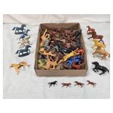 Box of Plastic Toy Horses and Figurines