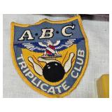 Assorted Vintage Collectibles including ABC Triplicate Club Patch, Microphone Tie Pin, Gold Shoe Keyring, Tie Clip and Novelty Items