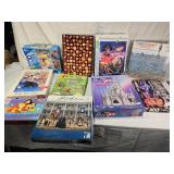 Lot of Jigsaw Puzzles including Disney 8 Puzzle Pack, Ravensburger 1500 Piece Puzzle, and More - Uncounted