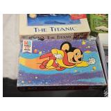 Lot of Jigsaw Puzzles including Disney 8 Puzzle Pack, Ravensburger 1500 Piece Puzzle, and More - Uncounted
