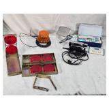 Vintage Automotive Safety and First Aid Lot including Sears Massager, Do-Ray Flip Up Flare, and 1960s Sentinel First Aid Kit
