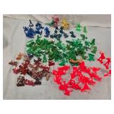 Plastic Toy Cowboys and Indians Figures in Various Colors and Poses