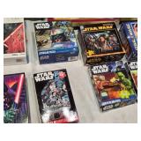 Huge Lot of Star Wars Puzzles including The Empire Strikes Back 1500 Piece Puzzle, Episode I Podrace Challenge Puzzle, and Lenticular Puzzles - Uncounted