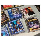 Huge Lot of Star Wars Puzzles including The Empire Strikes Back 1500 Piece Puzzle, Episode I Podrace Challenge Puzzle, and Lenticular Puzzles - Uncounted