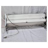 Antique Style Fluorescent Light Fixture with Ornate Metal Ends