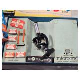 Vintage Board Games and Toys Collection including Porter Microcraft Microscope, Put and Take Game, Dollhouse, and Accessories