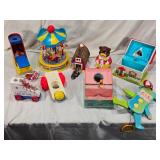 Vintage toys including Carousel, Musical Boxes, and Lacing Shoes