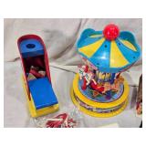 Vintage toys including Carousel, Musical Boxes, and Lacing Shoes