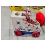 Vintage toys including Carousel, Musical Boxes, and Lacing Shoes