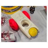 Vintage toys including Carousel, Musical Boxes, and Lacing Shoes