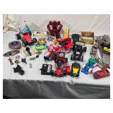 Vintage and Modern Toys including Tin Train Set, Toy Cars, and Action Figures