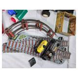 Vintage and Modern Toys including Tin Train Set, Toy Cars, and Action Figures