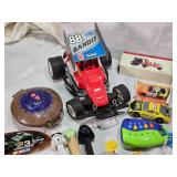 Vintage and Modern Toys including Tin Train Set, Toy Cars, and Action Figures