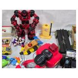 Vintage and Modern Toys including Tin Train Set, Toy Cars, and Action Figures