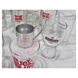 Lot of Barware Glasses and Mugs Including Schlitz, Miller, Heineken, Smirnoff Mule and More