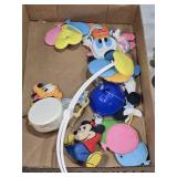 Vintage and Modern Toys Collection including Disney Mobiles, Tomy Toys, and Fisher-Price Carousel