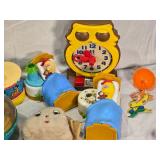 Vintage and Modern Toys Collection including Disney Mobiles, Tomy Toys, and Fisher-Price Carousel