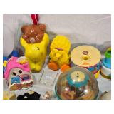 Vintage and Modern Toys Collection including Disney Mobiles, Tomy Toys, and Fisher-Price Carousel