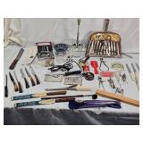 Assorted kitchen utensils and vintage tools including Town & Country cutlery and White Decorative Zigzagger, Acme Nut Chopper, and other items.