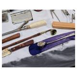 Assorted kitchen utensils and vintage tools including Town & Country cutlery and White Decorative Zigzagger, Acme Nut Chopper, and other items.