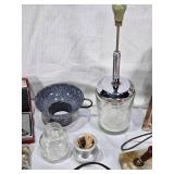 Assorted kitchen utensils and vintage tools including Town & Country cutlery and White Decorative Zigzagger, Acme Nut Chopper, and other items.