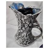 Assorted vintage decorative items including a Atlantic Mold Ceramic Victorian shoe, USA Ceramic Pitcher, Mango Wood Container, beer stein and More