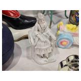 Assorted vintage decorative items including a Atlantic Mold Ceramic Victorian shoe, USA Ceramic Pitcher, Mango Wood Container, beer stein and More