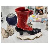 Assorted vintage decorative items including a Atlantic Mold Ceramic Victorian shoe, USA Ceramic Pitcher, Mango Wood Container, beer stein and More