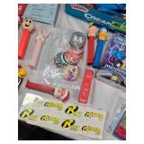 Lot of Vintage Toys and Collectibles including Little Tikes Piggy Bank, Toy Story Kite, and Trading Cards Like PukeMon