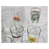 Lot of Various Glassware and Mugs Including Tuborg Gold Mug, White Horse Whiskey Pitcher, and Lind