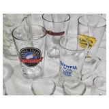 Lot of Various Glassware and Mugs Including Tuborg Gold Mug, White Horse Whiskey Pitcher, and Lind