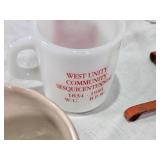 Assorted mugs and glasses including Kimball MN glass mug, Lutsen Glass, Oakley National Bank, Budweiser mugs, and various commemorative mugs