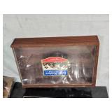 Dutch Masters cigar showcase box, a Caesar leather keepsake box, and a Norman Rockwell 1991 calendar from Elmquist Jewelers