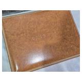 Dutch Masters cigar showcase box, a Caesar leather keepsake box, and a Norman Rockwell 1991 calendar from Elmquist Jewelers