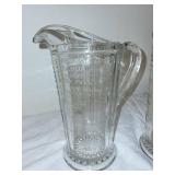 Pair of Antique Glass Measuring Pitchers with Embossed Measurements