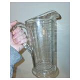 Pair of Antique Glass Measuring Pitchers with Embossed Measurements