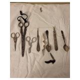 Vintage Silverware and Scissors Collection with Intricate Designs