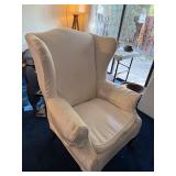 Elegant Cream Upholstered Wingback Chair