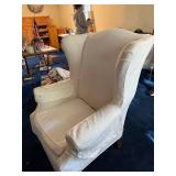 Elegant Cream Upholstered Wingback Chair