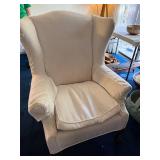 Elegant Cream Upholstered Wingback Chair